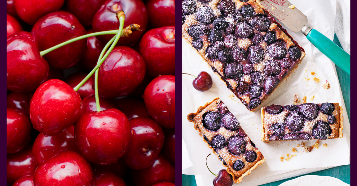 Close-up of fresh red cherries next to a sliced cherry hazelnut frangipane tart, dusted with icing sugar.