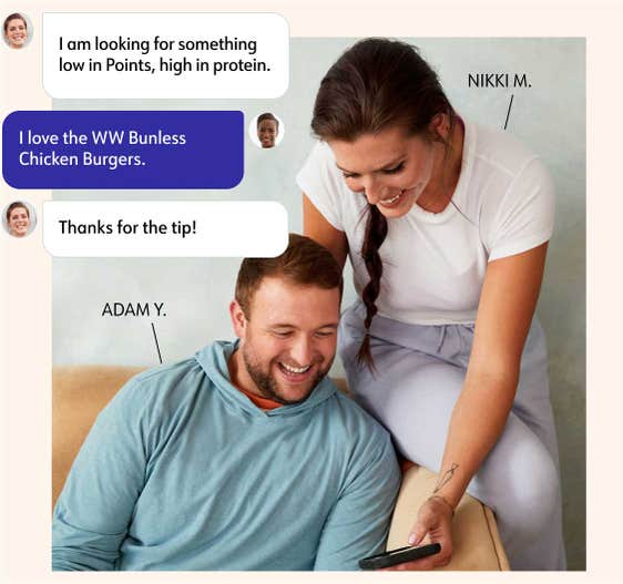 WW members Adam Y. and Nikki M. look at a mobile phone that Nikki is using. Also shown is a chat with a coach in the WW app.