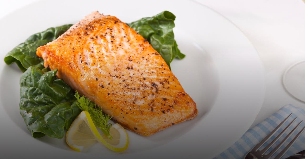 Spicy-Crusted Salmon Over Spinach