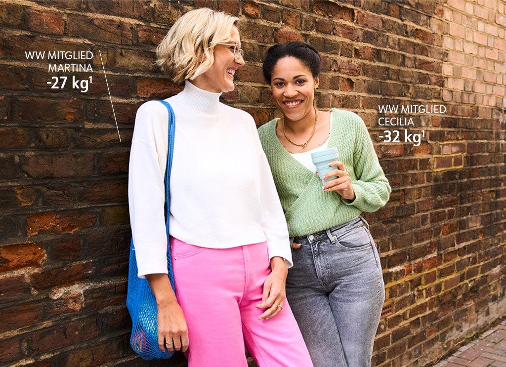 WW Mitglieder Martina und Cecilia stehen vor einer Backsteinwand