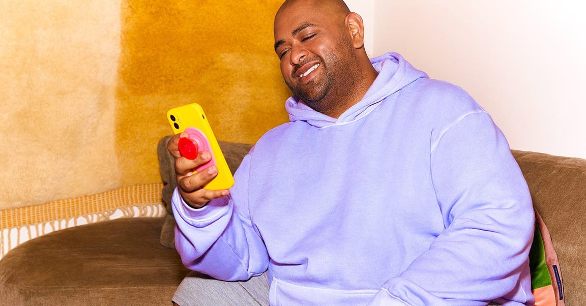 man looking into his phone