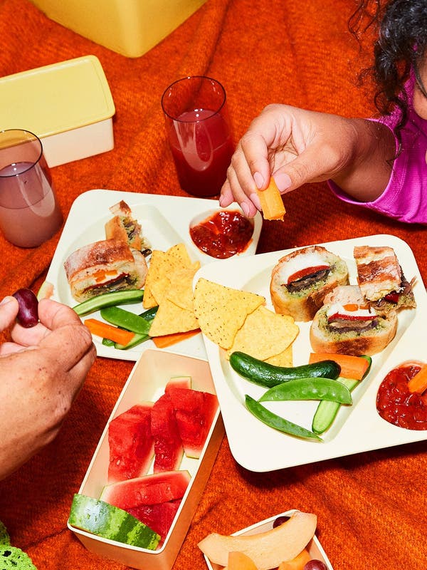 a woman and man eating food