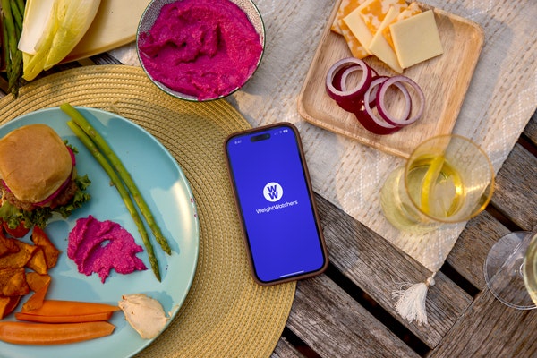 phone on table loading weightwatchers app