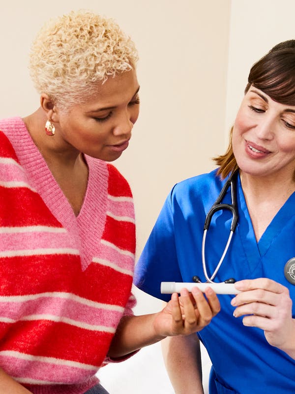 a women with a nurse