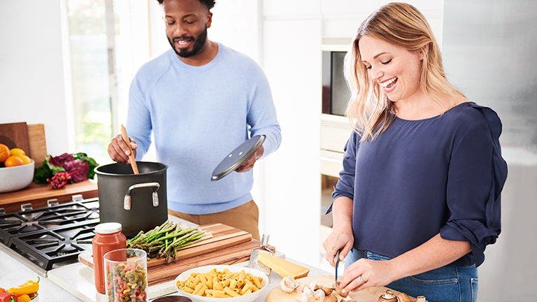 people cooking healthy food