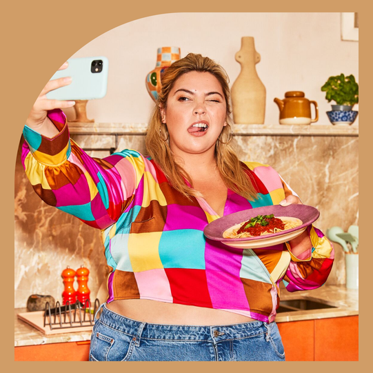 woman using WeightWatchers app on her cellphone