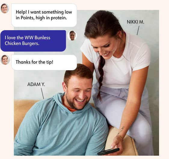 WW members Adam Y. and Nikki M. look at a mobile phone that Nikki is using. Also shown is a chat with a coach in the WW app.