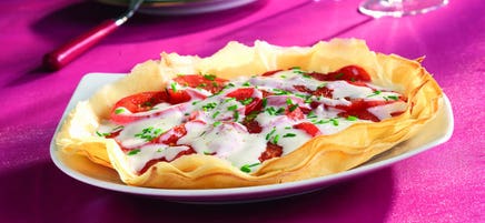 Tarte fine aux tomates fraîches, fromage frais et ciboulette
