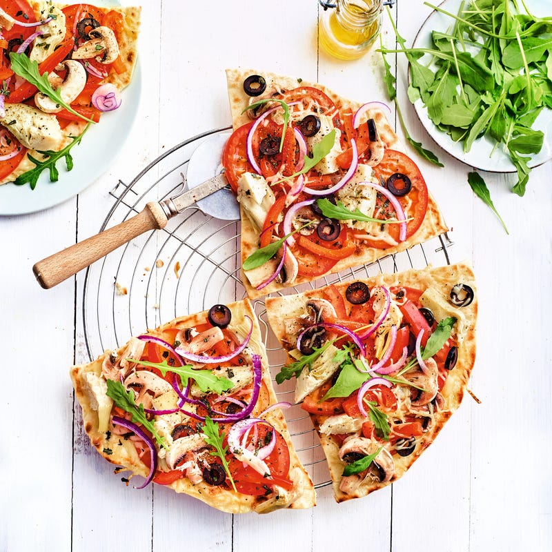 Pizzas grillées aux légumes et roquette