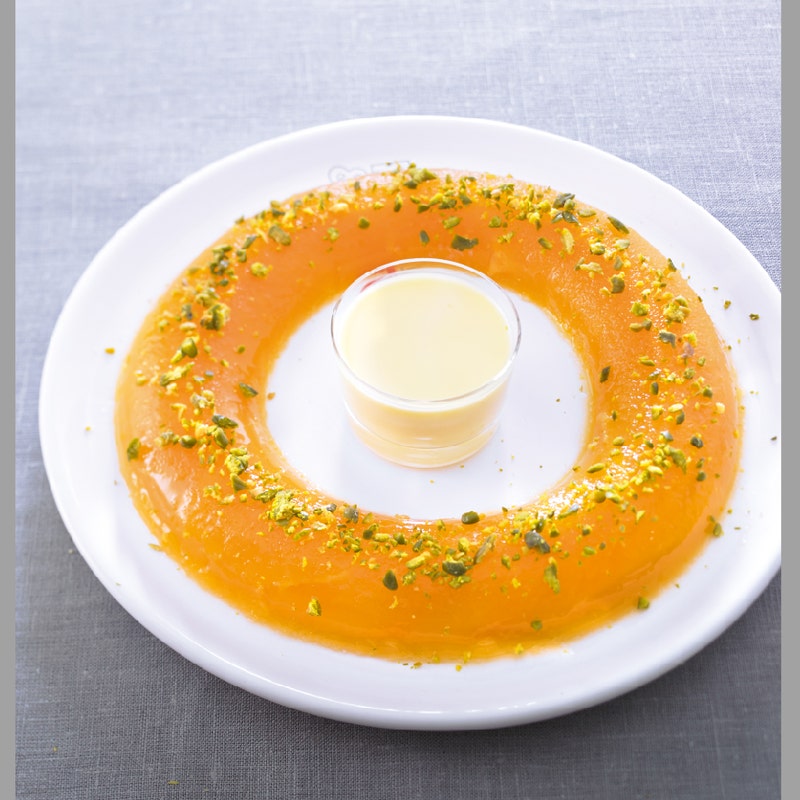 Aspic d'orange à la pistache et crème anglaise
