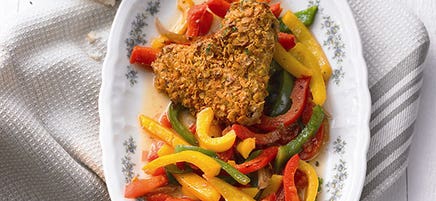 Ailes de poulet sur lit de poivrons