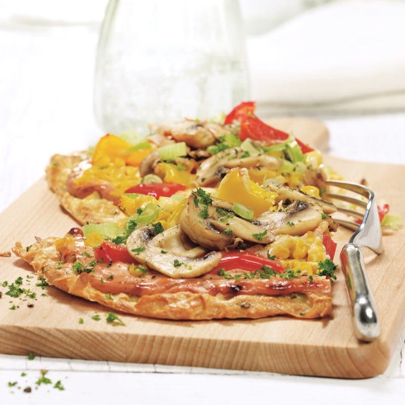 Photo de Pizza colorée aux pommes de terre et aux légumes prise par WW