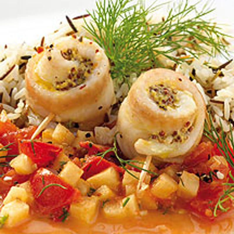 Foto van Zeetongrolletjes op een bedje van selder en tomaten door WW