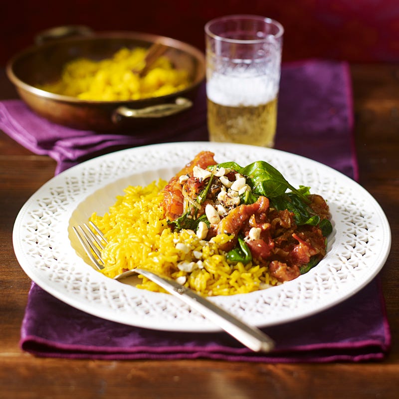 Kürbis-Curry mit Spinat, Cashewnüssen und gelbem Reis