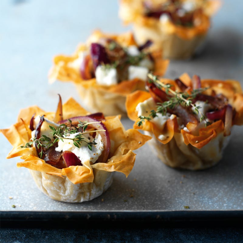 Photo of Caramelised red onion and goat’s cheese tarts by WW