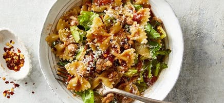 Bowtie pasta with sausage and escarole