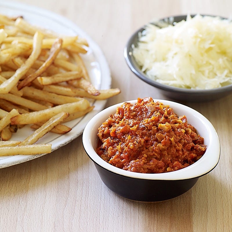 Photo de Poutine à l’espagnole avec sauce romesco par WW