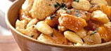Tagine de poulet aux abricots et aux amandes