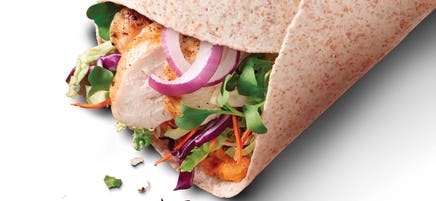 Hummus and shredded chicken vegetable wraps