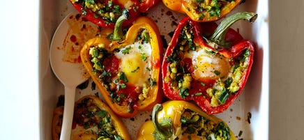 Baked bell peppers with chickpea mash, eggs, and harissa