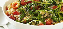 Sauté à l'orge, aux tomates raisins et à la roquette