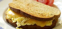 Egg sandwich with cheese sauce