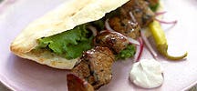 Shish kebabs in pita bread with tahini dressing