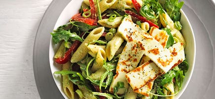 Warm pesto and haloumi pasta salad