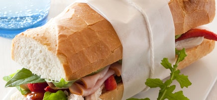 Ham and chicken baguette with tomato relish