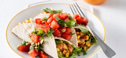 Corn and bean burritos with tomato salsa