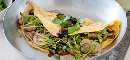 Asian mushroom omelette with snow pea sprouts