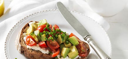 Rye toast with avocado and tomato salsa