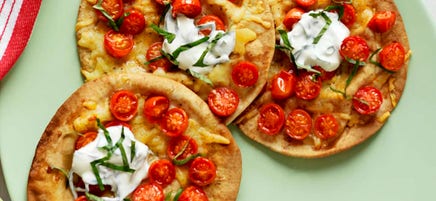 Roasted cherry tomato, basil and sour cream pizzas