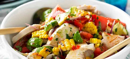 Poached coriander chicken salad with corn, avocado and tomato