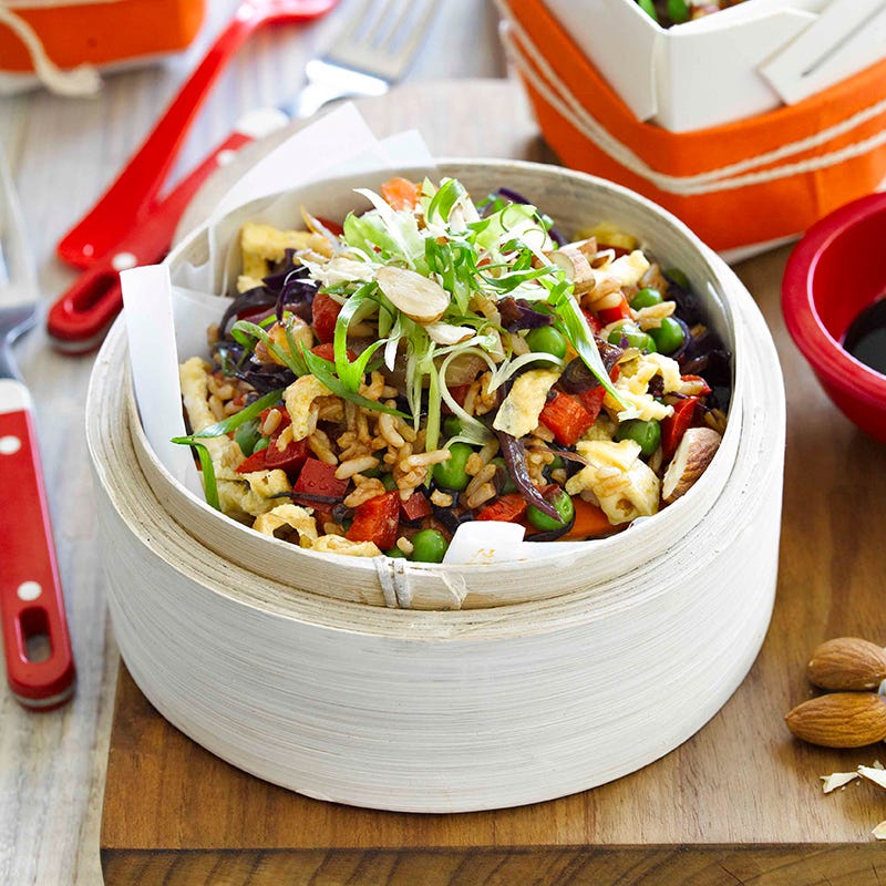 Fried rice with egg, peas and almonds