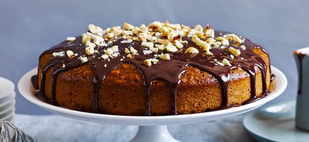 Coffee and hazelnut cake with hot chocolate sauce