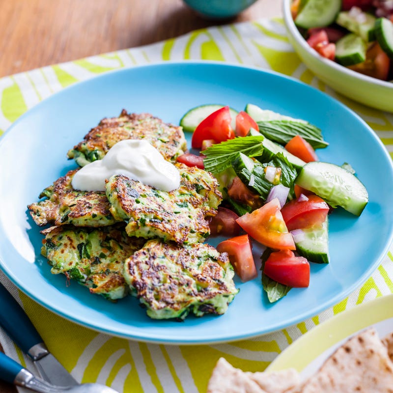 Zucchini and haloumi fritters with yoghurt