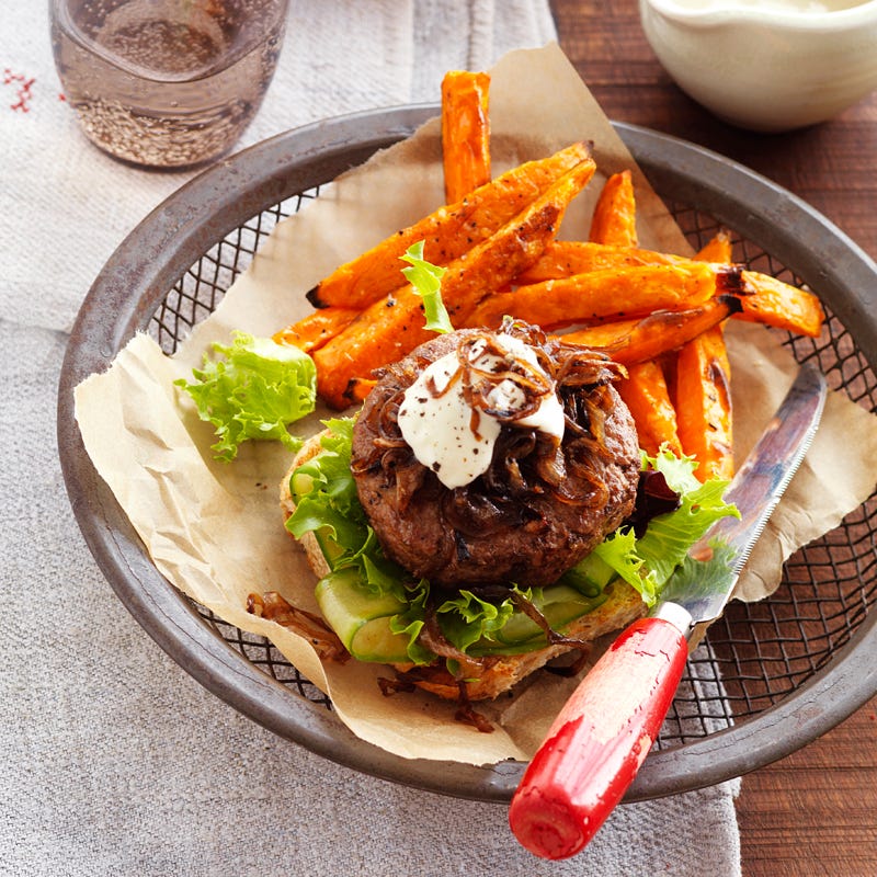 Beef burger with balsamic caramelised onions and sweet potato fries