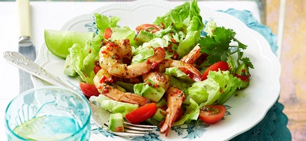 Cajun prawns with avocado and tomato salad