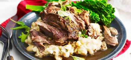 Slow roasted spanish lamb with smashed white beans