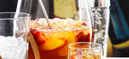 Peach and strawberry champagne punch