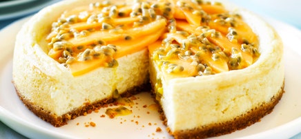 Classic baked cheesecake with mango and passionfruit