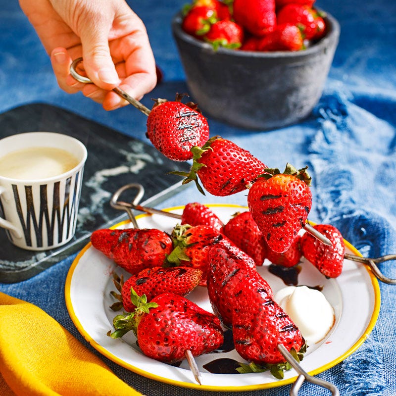 Strawberry skewers with orange and balsamic syrup