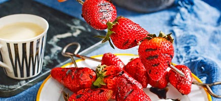 Strawberry skewers with orange and balsamic syrup