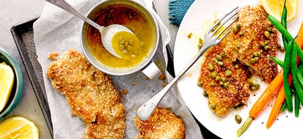 Quinoa crumbed pork schnitzels with lemon caper sauce