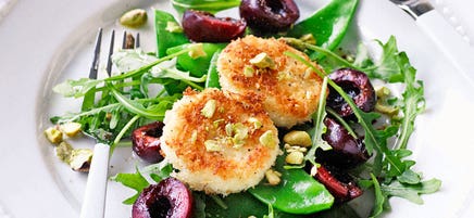 Crumbed goat's cheese, fresh cherry and rocket salad