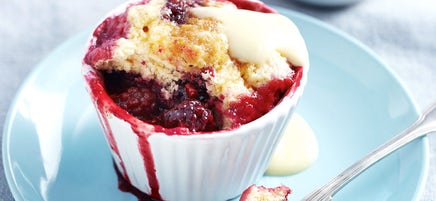 Orange and berry microwave self-saucing puddings