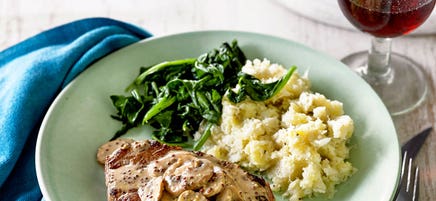 Grilled steak with mushroom sauce and cauliflower mash