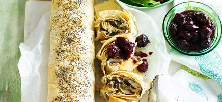 Mushroom strudel with spiced cherry sauce