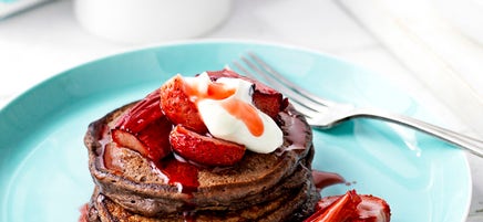 Chocolate and ricotta pancakes with roasted rhubarb and strawberries